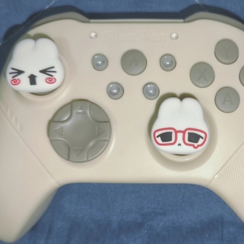 귀여운 만화 복고풍 안경 토끼 실리콘 엄지 그립 스위치 - Gaming Accessories In China 리뷰 및 가격